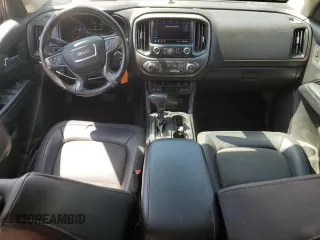 2021 GMC Canyon 4WD AT4 w/Cloth with VIN 1GTG6FEN4M1211349, listed as a Copart auction lot 52417985 with 63,744 mi miles and Salvage Title. Bid and sale history available at carsss.com. Image 8.