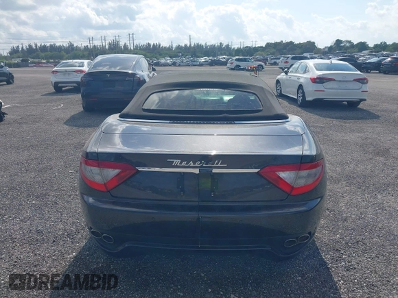 2013 Maserati GranTurismo Convertible Sport with VIN ZAM45MMA2D0069786, listed as a IAAI auction lot 40874830 with 37,312 mi miles. Bid and sale history available at carsss.com. Image 16.