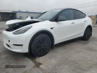 2023 Tesla Model Y Long Range with VIN 7SAYGDEE2PF860135, listed as a Copart auction lot 50380975 with 25,334 mi miles and Salvage Title. Bid and sale history available at DreamBid. Image 1.