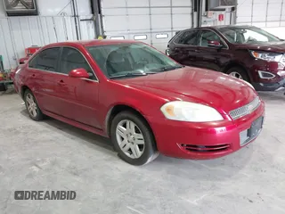 2013 Chevrolet Impala LT with VIN 2G1WB5E32D1195848, listed as a IAAI auction lot 41883788 with 170,747 mi miles and . Bid and sale history available at DreamBid. Image 1.