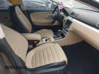 2013 Volkswagen CC Sport with VIN WVWBP7AN1DE520434, listed as a IAAI auction lot 41565789 with 273,503 mi miles. Bid and sale history available at carsss.com. Image 5.