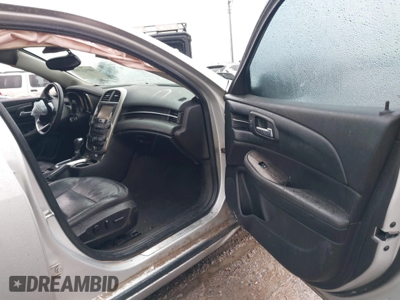 2014 Chevrolet Malibu LTZ with VIN 1G11H5SL7EF110073, listed as a IAAI auction lot 40911393 with Not Provided miles and . Bid and sale history available at DreamBid. Image 5.