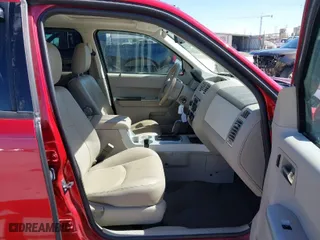 2008 Mercury Mariner Premier with VIN 4M2CU87188KJ52214, listed as a IAAI auction lot 41808878 with 131,953 mi miles. Bid and sale history available at carsss.com. Image 5.