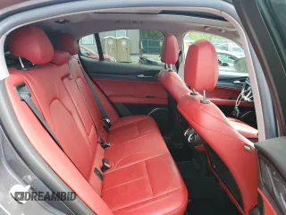 2018 Alfa Romeo Stelvio z VIN ZASFAKANXJ7B81315, wystawiony jako Copart lot #55528675 z przebiegiem 163 957 mil mil oraz Czysty tytuł • Clean title. Historia ofert i sprzedaży dostępna na DreamBid. Obrazek 11.