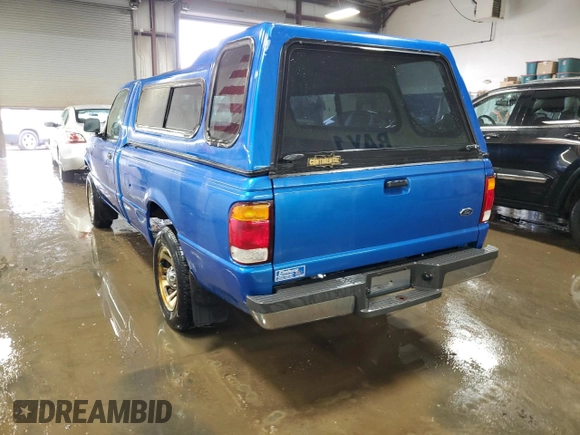 1999 Ford Ranger XLT with VIN 1FTYR10X0XUA52307, listed as a Copart auction lot 50044505 with 94,457 mi miles and Salvage title. Bid and sale history available at DreamBid. Image 2.