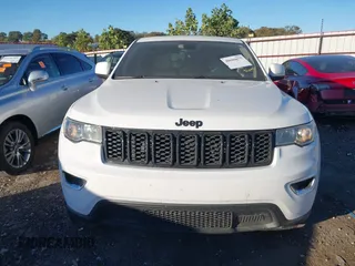 2017 Jeep Grand Cherokee Laredo with VIN 1C4RJEAG1HC903264, listed as a IAAI auction lot 40606675 with 144,106 mi miles. Bid and sale history available at carsss.com. Image 13.