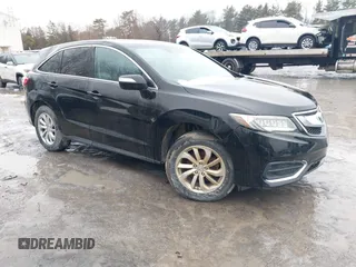 2016 Acura RDX with VIN 5J8TB4H38GL015305, listed as a IAAI auction lot 41672385 with 121,623 mi miles. Bid and sale history available at carsss.com. Image 1.