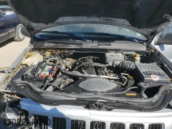 2004 Jeep Grand Cherokee Laredo with VIN 1J4GW48S54C349888, listed as a Copart auction lot 43009574 with 238,247 mi miles and Salvage title. Bid and sale history available at DreamBid. Image 11.