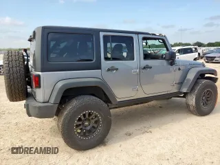2015 Jeep Wrangler Unlimited Rubicon z VIN 1C4BJWFG0FL529310, wystawiony jako Copart lot #64337405 z przebiegiem Nie podano mil oraz Szkoda całkowita • Salvage title. Historia ofert i sprzedaży dostępna na DreamBid. Obrazek 3.