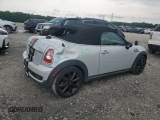 2015 MINI Roadster S z VIN WMWSY3C55FT595894, wystawiony jako Copart lot #56257194 z przebiegiem 66 704 mil mil oraz Szkody całkowita. Historia ofert i sprzedaży dostępna na DreamBid. Obrazek 3.