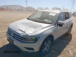 2018 Volkswagen Tiguan SEL Premium with VIN 3VV5B7AX5JM004713, listed as a IAAI auction lot 40498843 with 92,256 mi miles and . Bid and sale history available at DreamBid. Image 6.
