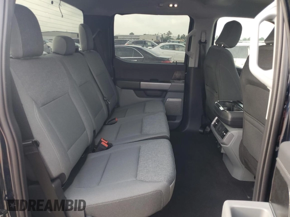 2024 Ford F-150 Lightning Flash with VIN 1FT6W3L7XRWG19735, listed as a Copart auction lot 54361215 with 7,764 mi miles and Salvage Title. Bid and sale history available at DreamBid. Image 11.