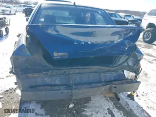 2003 Mitsubishi Lancer ES with VIN JA3AJ26E13U0A3996, listed as a IAAI auction lot 41251250 with 223,311 mi miles. Bid and sale history available at carsss.com. Image 6.
