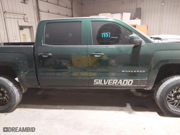 2015 Chevrolet Silverado 1500 LT with VIN 3GCUKREC4FG147784, listed as a IAAI auction lot 41501887 with 135,086 mi miles. Bid and sale history available at carsss.com. Image 13.