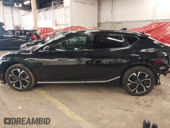 2022 Kia EV6 Wind z VIN KNDC3DLC8N5075492, wystawiony jako IAAI lot #41671331 z przebiegiem 22 122 mil mil oraz . Historia ofert i sprzedaży dostępna na DreamBid. Obrazek 15.