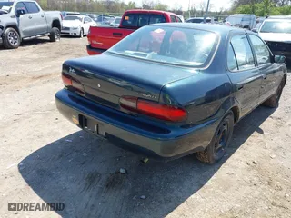 1997 Geo Prizm with VIN 1Y1SK5268VZ462502, listed as a IAAI auction lot 41929276 with 243,149 mi miles. Bid and sale history available at carsss.com. Image 4.