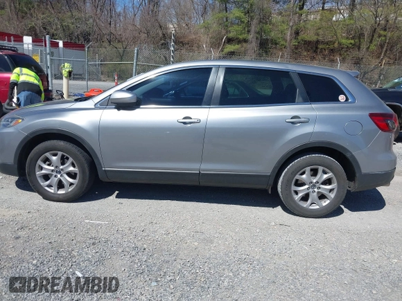 2015 Mazda CX-9 Sport with VIN JM3TB2BA7F0450544, listed as a IAAI auction lot 41812565 with 81,727 mi miles and . Bid and sale history available at carsss.com. Image 14.