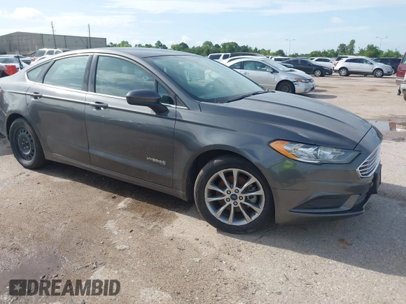 2017 Ford Fusion Hybrid SE with VIN 3FA6P0LU5HR336779, listed as a IAAI auction lot 42691789 with 140,720 mi miles and . Bid and sale history available at DreamBid. Image 1.