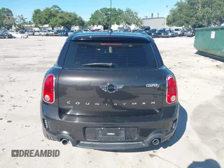 2015 MINI Countryman S with VIN WMWZC3C58FWT04316, listed as a IAAI auction lot 42525698 with 97,046 mi miles and . Bid and sale history available at DreamBid. Image 16.