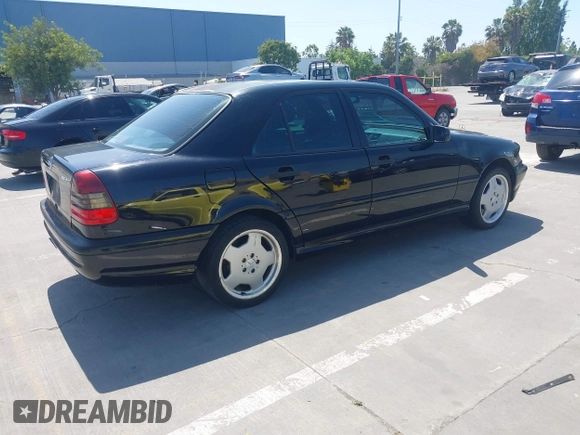 1999 Mercedes-Benz C with VIN WDBHA33G3XF889442, listed as a IAAI auction lot 42403800 with 82,075 mi miles and . Bid and sale history available at DreamBid. Image 4.