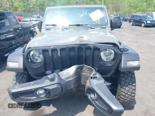 2021 Jeep Wrangler Unlimited Willys с VIN 1C4HJXDNXMW815548, выставлен на аукционе IAAI как лот 42226665 с пробегом 55 457 миль миль и . История ставок и продаж доступна на DreamBid. Изображение 6.
