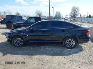 2019 Volkswagen Jetta SEL z VIN 3VWE57BU9KM064213, wystawiony jako IAAI lot #41916005 z przebiegiem 50 719 mil mil oraz . Historia ofert i sprzedaży dostępna na DreamBid. Obrazek 14.