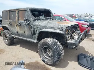 2016 Jeep Wrangler Unlimited Sahara with VIN 1C4HJWEG4GL261147, listed as a IAAI auction lot 42239252 with 69,604 mi miles and . Bid and sale history available at DreamBid. Image 1.