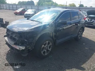 2018 Honda CR-V EX with VIN 7FARW1H59JE001943, listed as a IAAI auction lot 42123180 with 72,451 mi miles and . Bid and sale history available at carsss.com. Image 2.