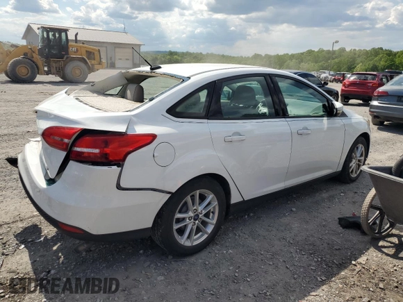 2016 Ford Focus SE с VIN 1FADP3F29GL323601, выставлен на аукционе Copart как лот 56407185 с пробегом 57 000 миль миль и Списание • Salvage title. История ставок и продаж доступна на DreamBid. Изображение 3.