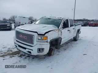 2015 GMC Sierra 2500HD available WiFi Denali with VIN 1GT120E88FF680538, listed as a IAAI auction lot 41571684 with 125,147 mi miles. Bid and sale history available at carsss.com. Image 2.