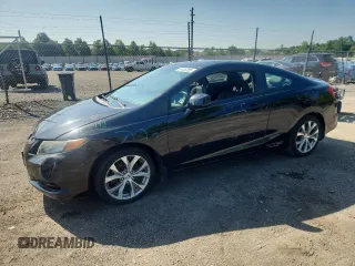 2012 Honda Civic Si with VIN 2HGFG4A51CH700201, listed as a Copart auction lot 61433285 with 68,512 mi miles and Salvage title. Bid and sale history available at DreamBid. Image 1.