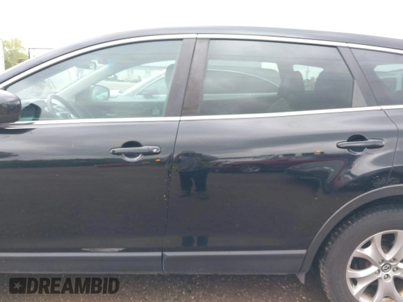 2015 Mazda CX-9 Sport with VIN JM3TB3BV1F0466070, listed as a IAAI auction lot 42350686 with 110,818 mi miles and . Bid and sale history available at DreamBid. Image 15.