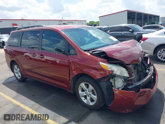 2015 Toyota Sienna LE AAS with VIN 5TDKK3DC7FS685452, listed as a IAAI auction lot 41942789 with 194,163 mi miles. Bid and sale history available at carsss.com. Image 1.