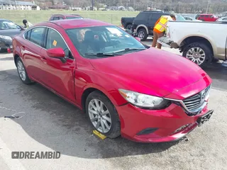 2016 Mazda 6 i Sport with VIN JM1GJ1U53G1409105, listed as a IAAI auction lot 41828135 with 136,812 mi miles and . Bid and sale history available at DreamBid. Image 1.