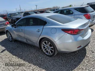 2017 Mazda 6 Touring with VIN JM1GL1V50H1114957, listed as a Copart auction lot 52309915 with 88,761 mi miles and Salvage Title. Bid and sale history available at DreamBid. Image 2.