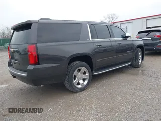 2015 Chevrolet Suburban LTZ with VIN 1GNSKKKC4FR712965, listed as a IAAI auction lot 41928053 with 188,571 mi miles. Bid and sale history available at carsss.com. Image 4.