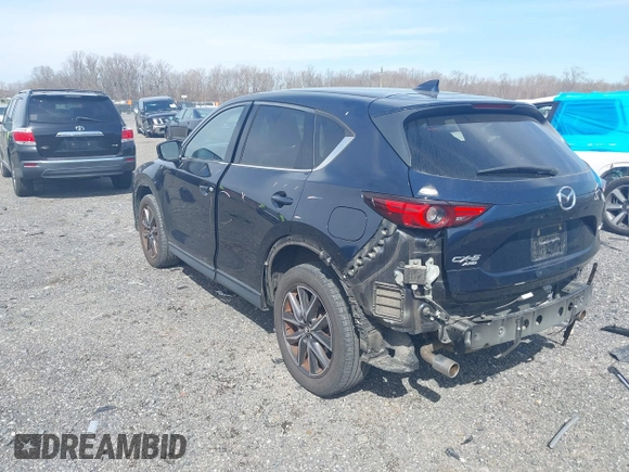 2018 Mazda CX-5 Grand Touring with VIN JM3KFBDM7J0343686, listed as a IAAI auction lot 41813638 with 74,084 mi miles. Bid and sale history available at carsss.com. Image 3.