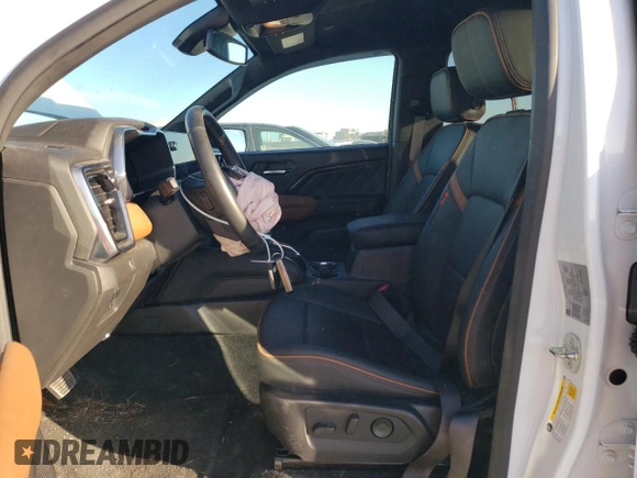 2023 GMC Canyon 4WD AT4 with VIN 1GTP6DEK6P1237045, listed as a Copart auction lot 74981784 with 18,036 mi miles and Salvage Title. Bid and sale history available at carsss.com. Image 7.