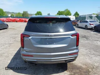 2022 Cadillac XT6 Premium Luxury z VIN 1GYKPDRS4NZ146284, wystawiony jako IAAI lot #42150678 z przebiegiem 28 890 mil mil oraz . Historia ofert i sprzedaży dostępna na DreamBid. Obrazek 17.