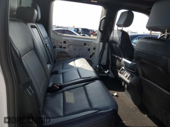 2022 Ford F-150 Lightning Pro z VIN 1FT6W1EV6NWG01209, wystawiony jako Copart lot #45301935 z przebiegiem 25 141 mil mil oraz Szkody całkowita. Historia ofert i sprzedaży dostępna na DreamBid. Obrazek 10.