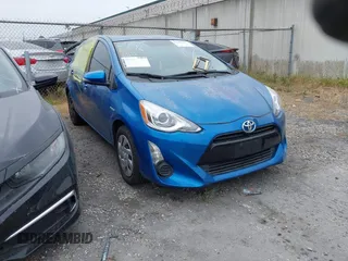 2015 Toyota Prius One z VIN JTDKDTB3XF1584531, wystawiony jako IAAI lot #42401457 z przebiegiem 142 789 mil mil oraz . Historia ofert i sprzedaży dostępna na DreamBid. Obrazek 1.