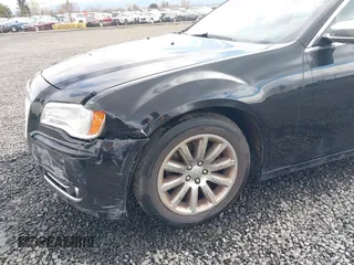 2012 Chrysler 300 Limited with VIN 2C3CCACG0CH263449, listed as a IAAI auction lot 41829134 with 157,108 mi miles. Bid and sale history available at carsss.com. Image 6.