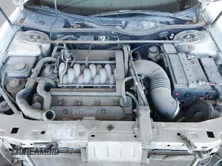 2000 Lincoln Continental with VIN 1LNHM97V9YY821894, listed as a IAAI auction lot 41657199 with 218,330 mi miles. Bid and sale history available at carsss.com. Image 10.