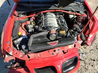 2005 Pontiac GTO with VIN 6G2VX12U05L396757, listed as a Copart auction lot 47105495 with 104,130 mi miles and Salvage Title. Bid and sale history available at carsss.com. Image 13.