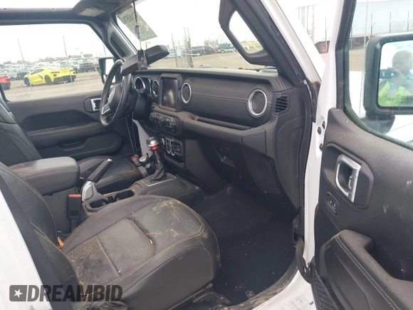2021 Jeep Gladiator High Altitude with VIN 1C6HJTFG2ML567988, listed as a IAAI auction lot 42103576 with 74,849 mi miles and . Bid and sale history available at DreamBid. Image 5.