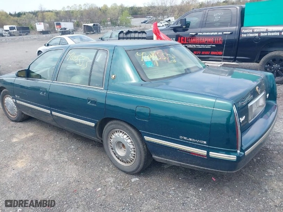 1999 Cadillac DeVille DHS with VIN 1G6KE54Y9XU766791, listed as a IAAI auction lot 42005553 with 140,515 mi miles. Bid and sale history available at carsss.com. Image 3.