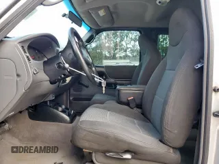 2003 Ford Ranger XL with VIN 1FTYR14V13PA20094, listed as a Copart auction lot 59298375 with 190,728 mi miles and Salvage title. Bid and sale history available at DreamBid. Image 7.