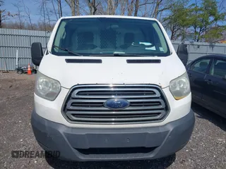 2015 Ford Transit Cargo with VIN 1FTNR1ZM9FKA56829, listed as a IAAI auction lot 42016014 with 261,768 mi miles. Bid and sale history available at carsss.com. Image 12.