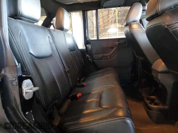 2015 Jeep Wrangler Unlimited Rubicon Hard Rock with VIN 1C4HJWFG1FL532288, listed as a Copart auction lot 62262545 with 91,807 mi miles and Salvage title. Bid and sale history available at DreamBid. Image 10.