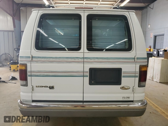 1993 Ford Econoline Cargo with VIN 1FDEE14Y5PHA07711, listed as a Copart auction lot 62064705 with 150,336 mi miles and Salvage title. Bid and sale history available at DreamBid. Image 6.